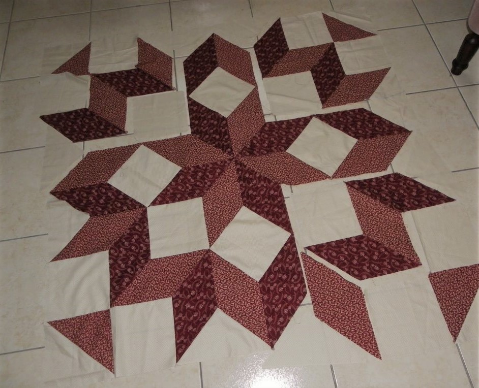 quilt carpenter wheel
ou la roue du charpentier
work in progress