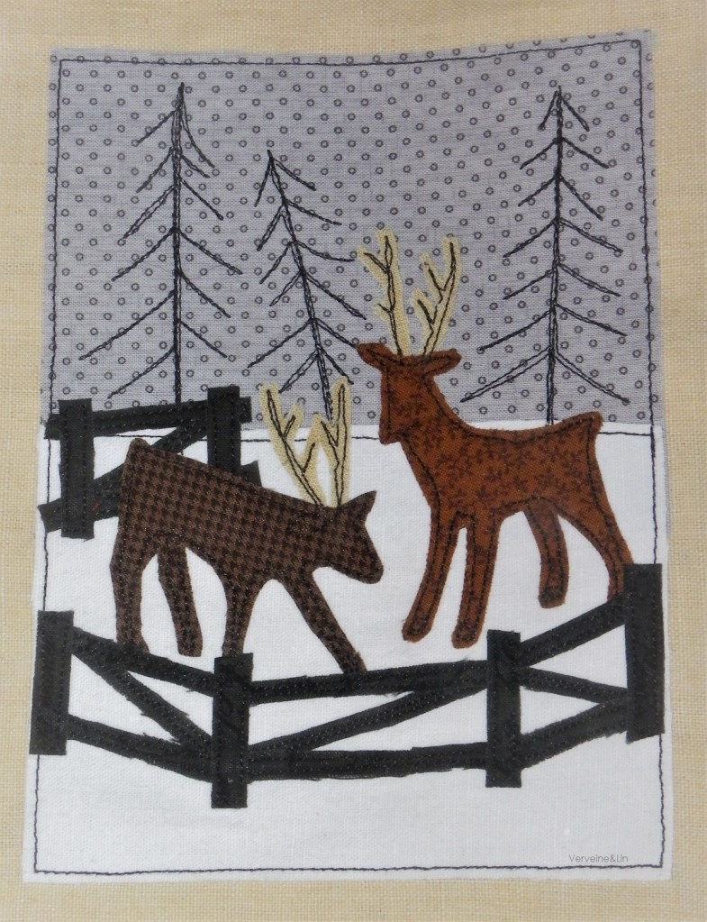 livre textile Le Village du père Noël
appliqué collé et broderie free motion