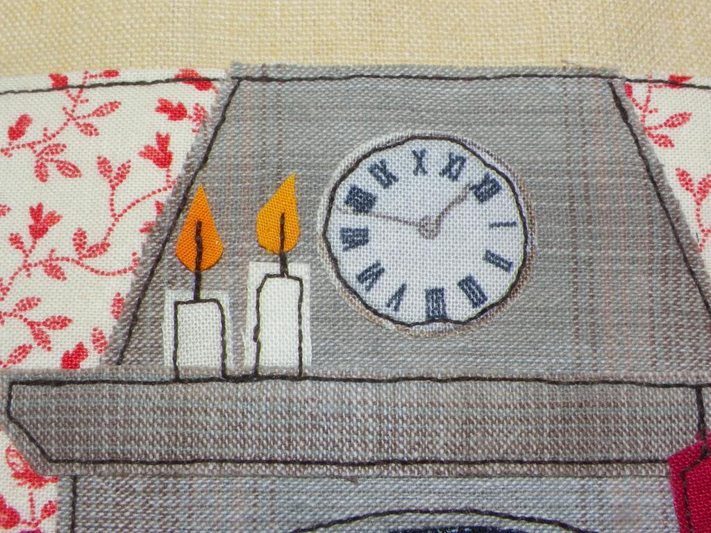 livre textile Le Village du père Noël
appliqué collé et broderie free motion