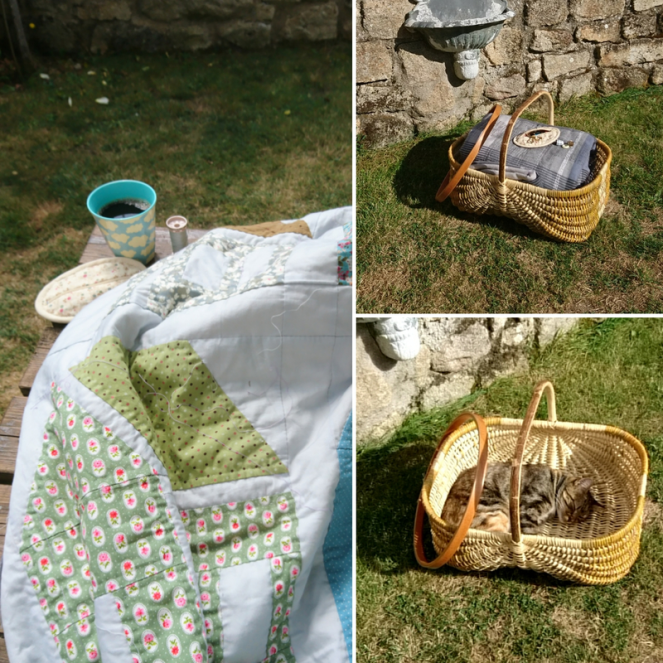 quilt avec des maisons en patchwork et un guirlande de feuillages en appliqués 