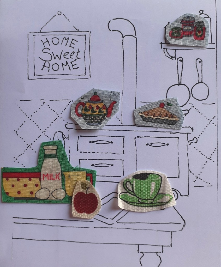 livre textile Le Village du père Noël
appliqué collé et broderie free motion