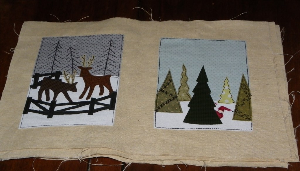 livre textile Le Village du père Noël
appliqué collé et broderie free motion