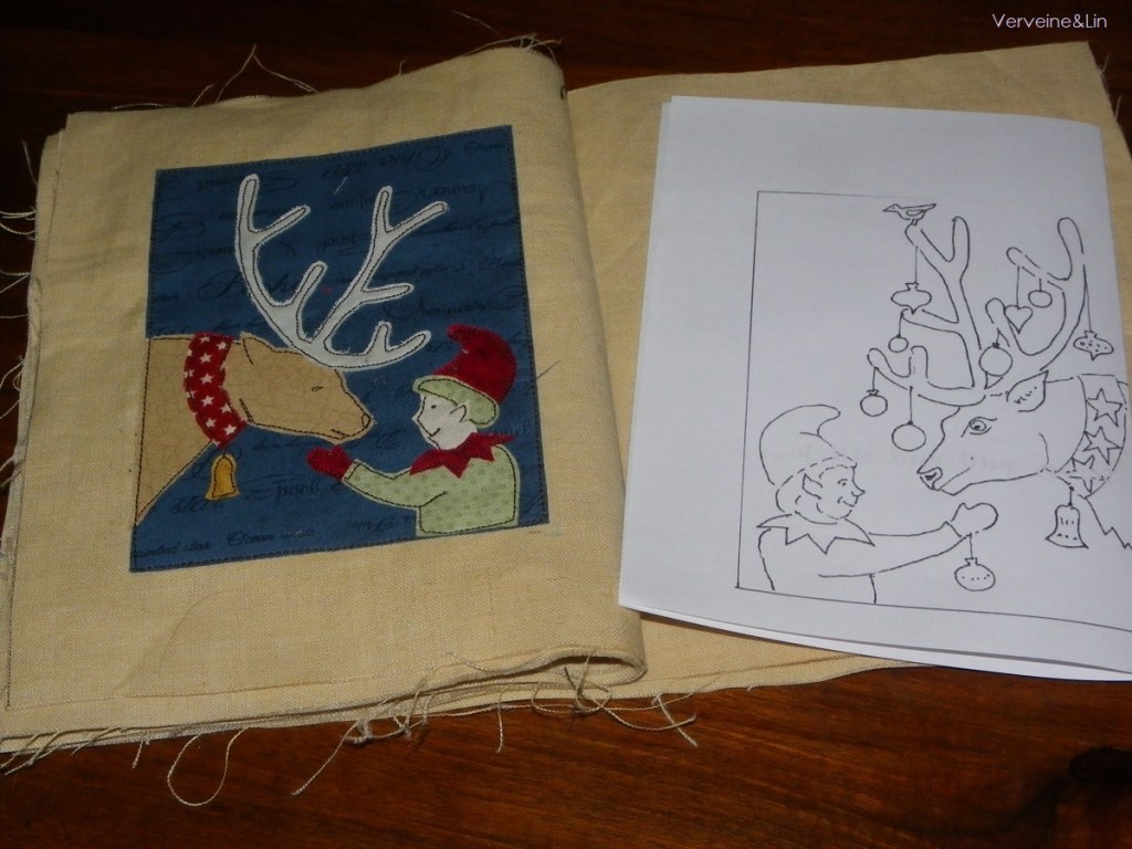 livre textile Le Village du père Noël
appliqué collé et broderie free motion