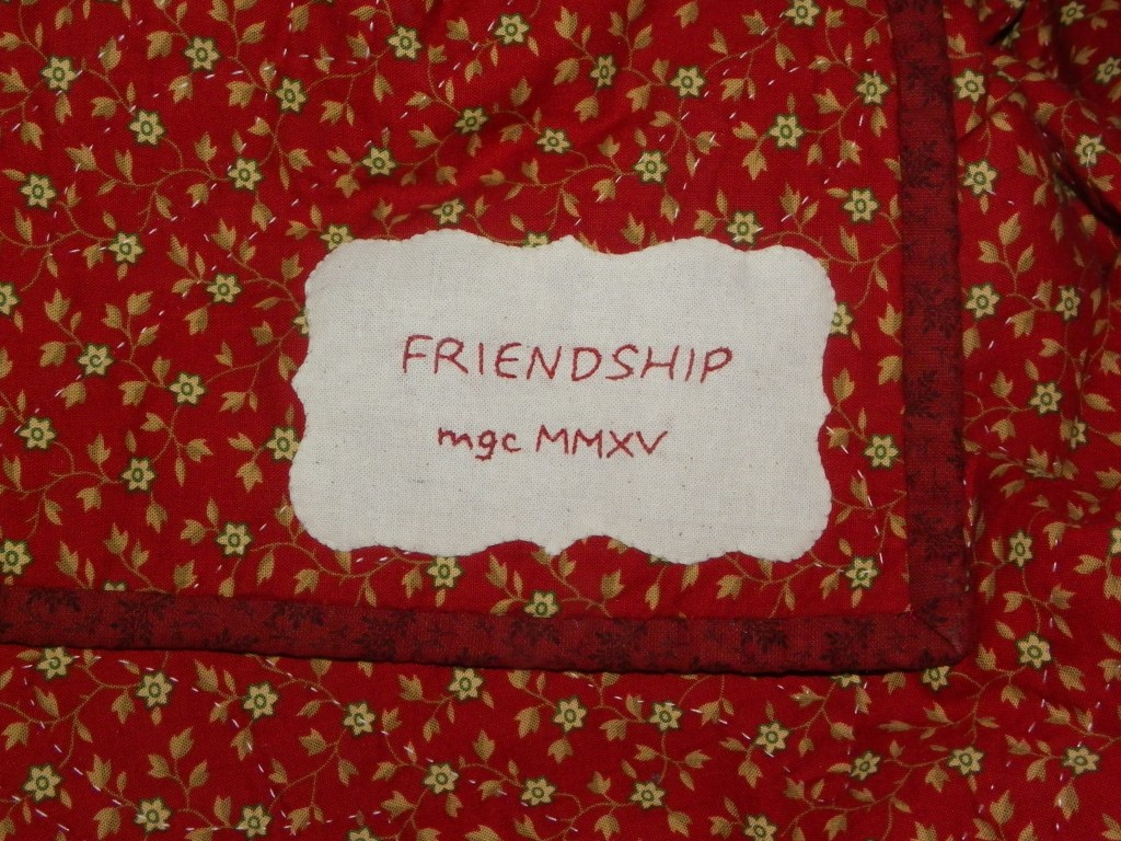 étiquette de quilt brodée 
