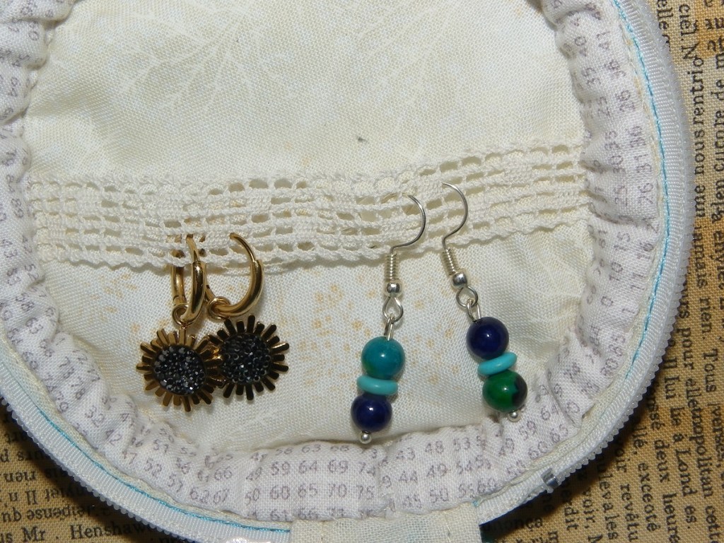 trousse ronde zippée pour ranger les bijoux