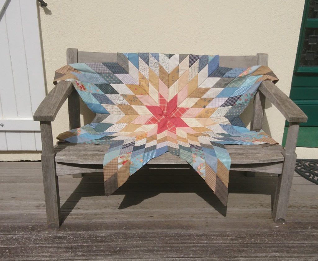 assemblage en patchwork à la main de l'étoile solitaire ou étoile de bethléem 