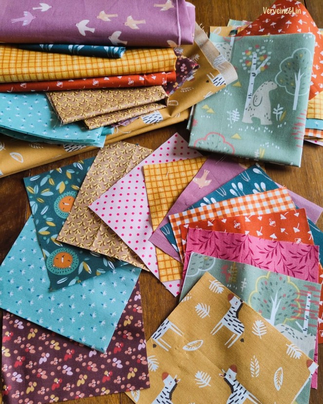carrés de tissu imprimés pour une couverture de bébé en patchwork